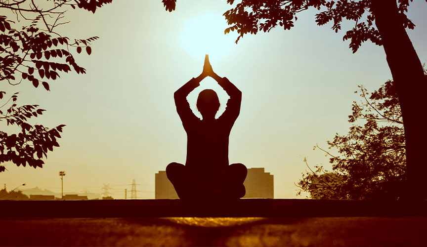 Photo of a responsible person doing yoga